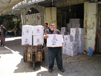 Red Cross food cartons ready for distribution