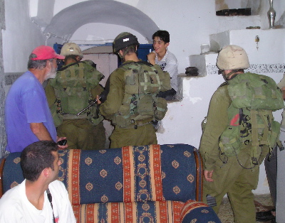 Soldiers leaving house